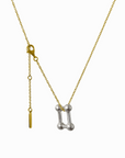 Crafted from sterling silver and yellow gold, our Single Link Drop Pendant can instantly elevate any look. A unique blend of fun and sophistication, this pendant can be arranged to your desired style – either dropped or knotted – to make a luxurious statement. Add a touch of class to your look with this modern, versatile piece.